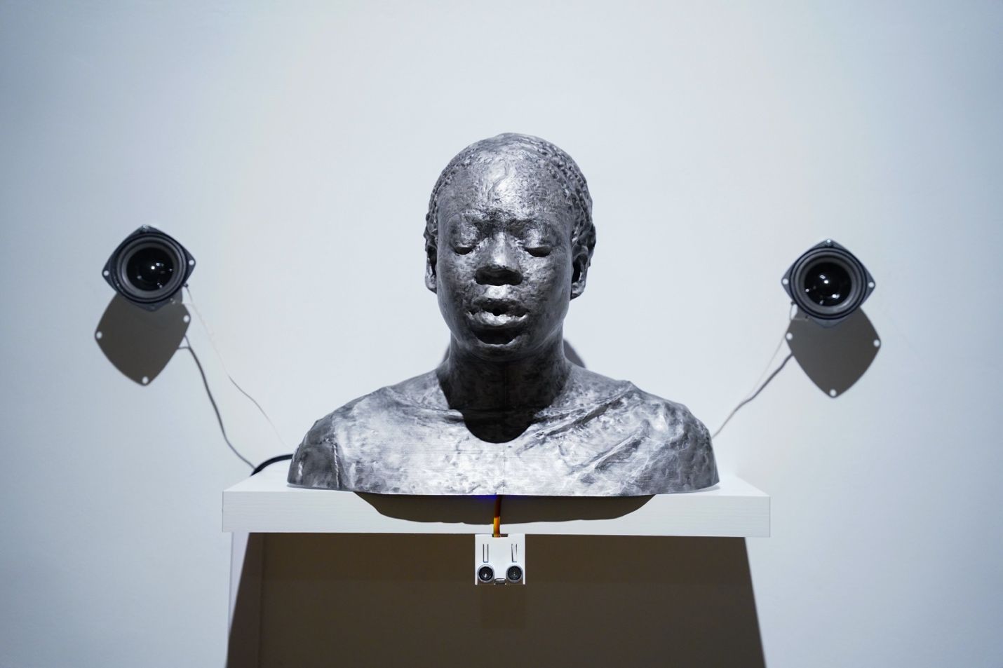 Metal bust of a woman