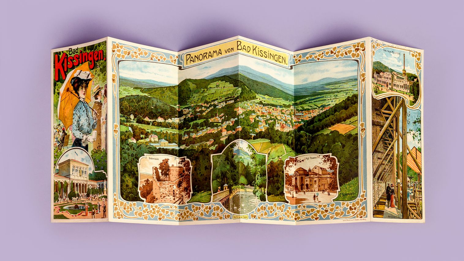 Wide, unfolded paper with colorful illustrations of landscapes and resort buildings
