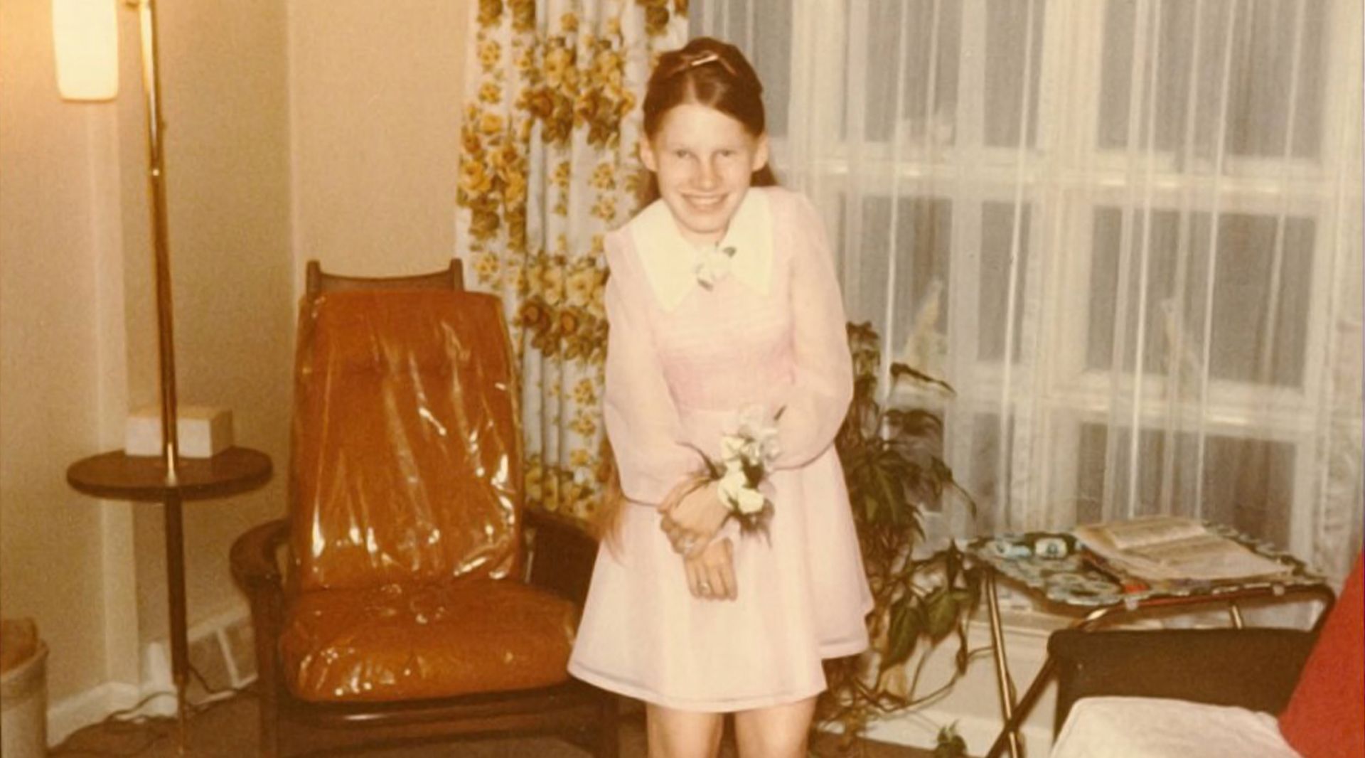 Photo of a young Carol Orzel in a pink dress and corsage