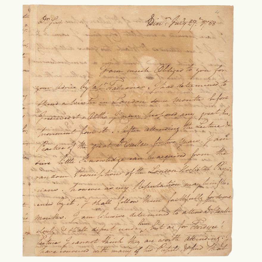 Aged brown paper with dark ink cursive text handwritten in a letter format