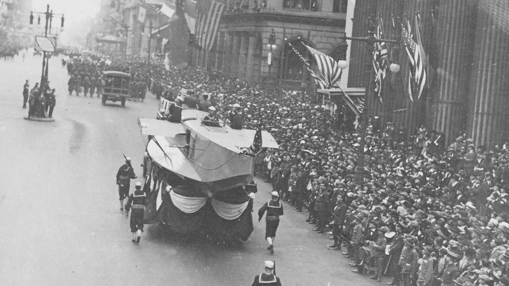 Historical photo of a parade down Broad Street
